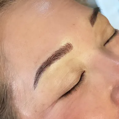 Microblading and microshading on a client with crisp hair strokes and soft tattoo shading