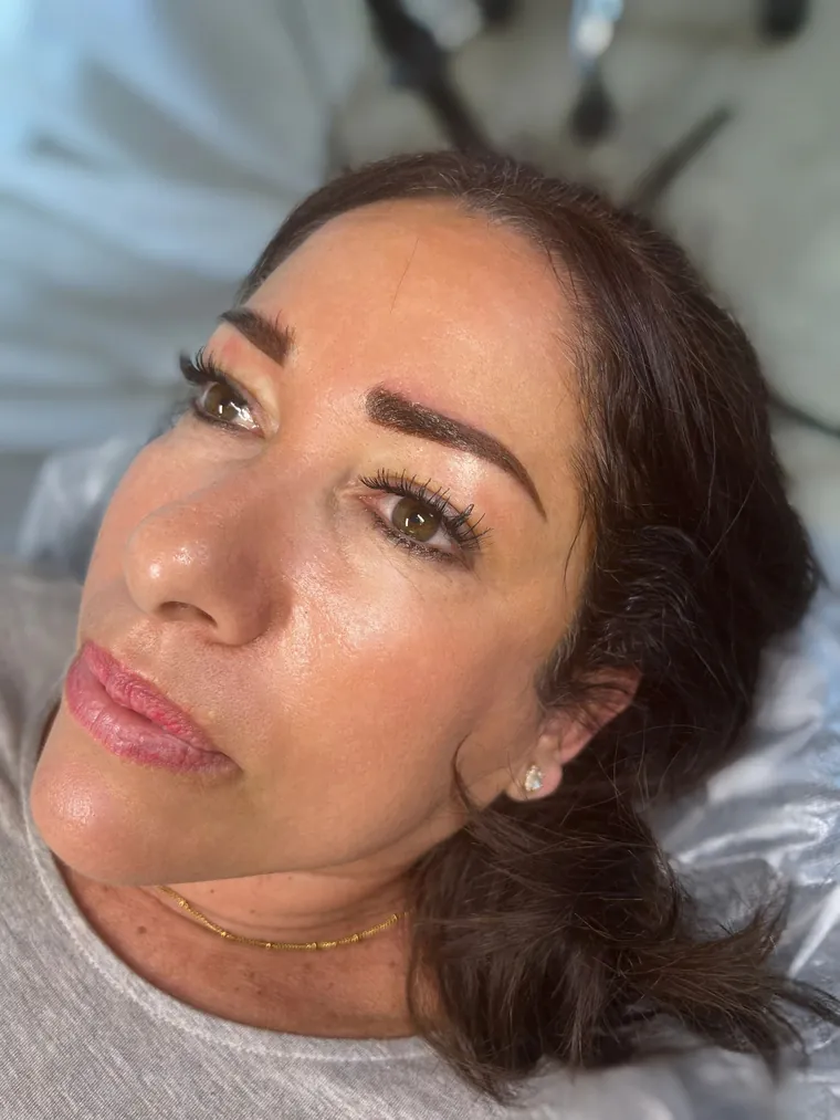 Healed brows and soft lip color on a Harlowe Beauty Studio client in Fernandina Beach